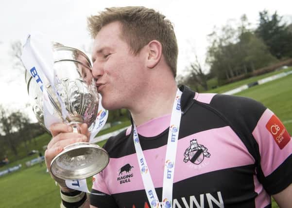 Ayr skipper Pete McCallum seals his team's Premiership play-off win over Melrose with a kiss. Picture: SNS/SRU