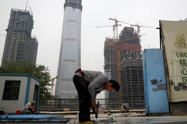 The world's second-largest economy is targeting growth of 6.5% this year. Picture: Andy Wong/AP