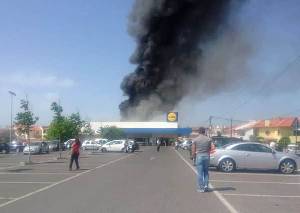 The plane crashed next to a Lidl store near Lisbon. Picture: Fabio Miguel/PA Wire