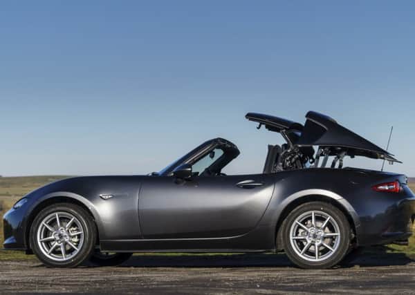 The retractable roof assembly adds 45kg to the weight