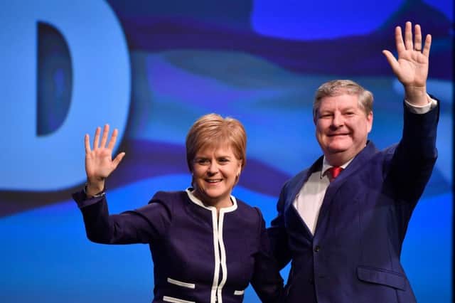 Moray MP Angus Robertson with Nicola Sturgeon. Picture: Getty Images