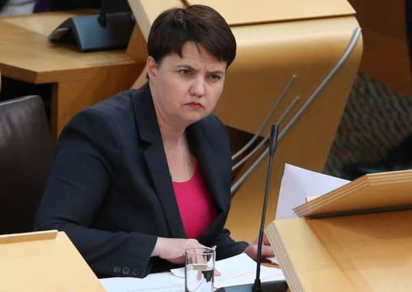 Scottish Conservative leader Ruth Davidson listen to Scotland's First Minister Nicola Sturgeon making a statement on BREXIT to MSP's in the debating chamber at the Scottish Parliament in the Edinburgh.