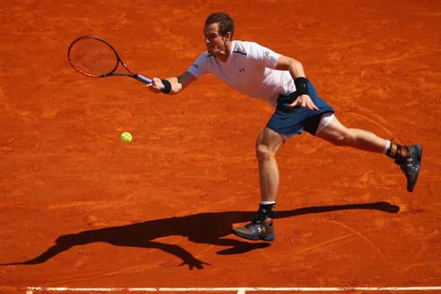 Andy Murray lunges to play a forehand during his victory over Gilles Muller in the second round of the Monte Carlo Rolex Masters. Picture: Clive Brunskill/Getty Images