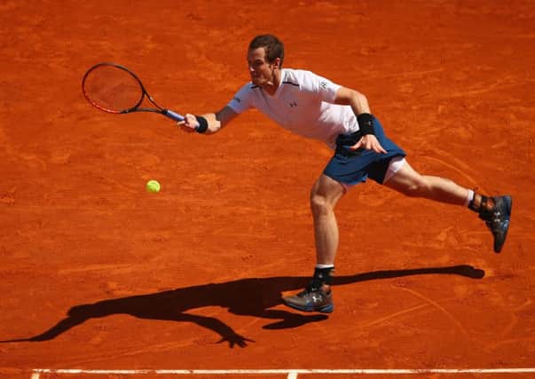 Andy Murray lunges to play a forehand during his victory over Gilles Muller in the second round of the Monte Carlo Rolex Masters. Picture: Clive Brunskill/Getty Images