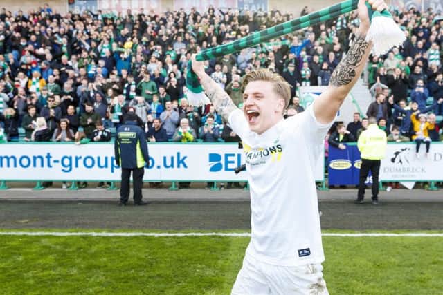 Jason Cummings celebrates Hibs' title win
. Picture: Roddy Scott/SNS