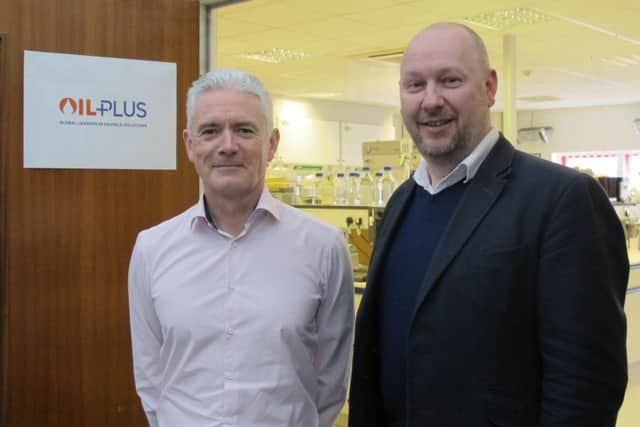 Mark Cavanagh, right, with Oil Plus managing director Kevin Murray, who will remain with the consultancy. Picture: Contributed
