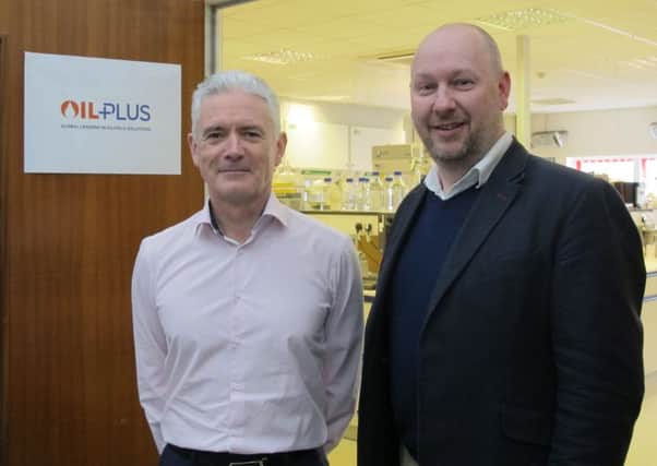 Mark Cavanagh, right, with Oil Plus managing director Kevin Murray, who will remain with the consultancy. Picture: Contributed