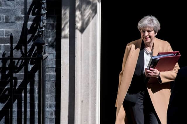 Theresa May said that Jeremy Corbyn was not fit to lead, but  faced criticism over her refusal to take part in TV debates. Picture: AFP/Getty Images