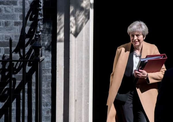 Theresa May said that Jeremy Corbyn was not fit to lead, but  faced criticism over her refusal to take part in TV debates. Picture: AFP/Getty Images