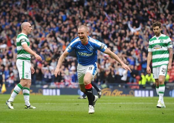 Kenny Miller celebrates having opened the scoring for Rangers in last year's semi-final. Picture: John Devlin