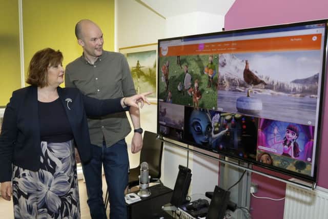 Culture secretary Fiona Hyslop with Richard Scott, chief of Glasgow-based Axis. Picture: Contributed