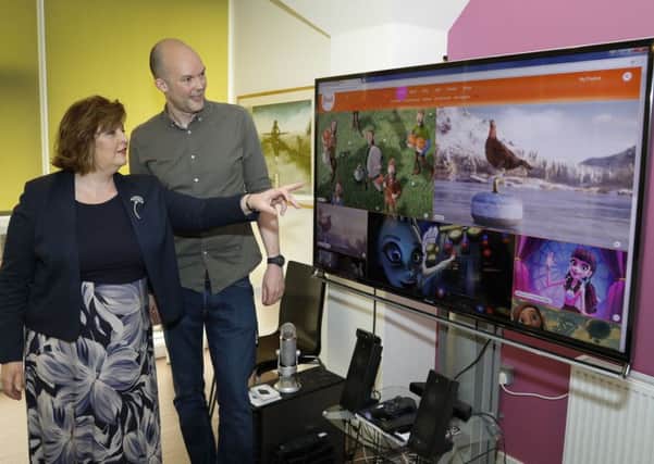 Culture secretary Fiona Hyslop with Richard Scott, chief of Glasgow-based Axis. Picture: Contributed