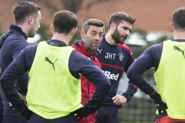 Rangers manager Pedro Caixinha speaks with his squad at training. Picture: SNS