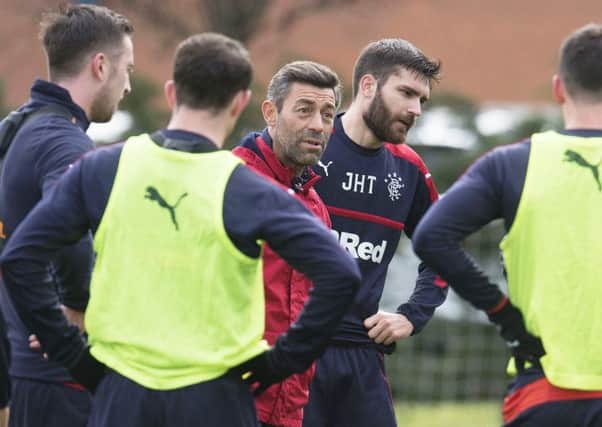Rangers manager Pedro Caixinha speaks with his squad at training. Picture: SNS