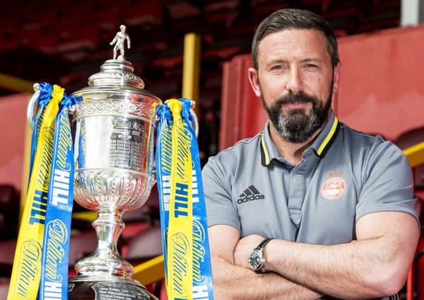 Aberdeen manager Derek McInnes hopes to mark his four-year reign with a semi-final win over Scottish Cup holders Hibs. Picture: SNS