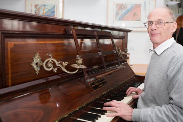 Piano tuner Martin Backhouse who made the discovery of gold coins. Picture: SWNS