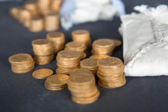 A "substantial" number of gold coins dating back more than a century were hidden in the piano. Picture: SWNS