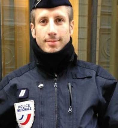 French police officer Xavier Jugele wgi was killed on the Champs-ElysÃ©es. Picture: AP