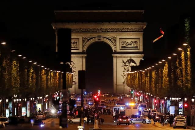 Police officers block the access to the Champs Elysees in Paris. Picture: AFP/Getty Images