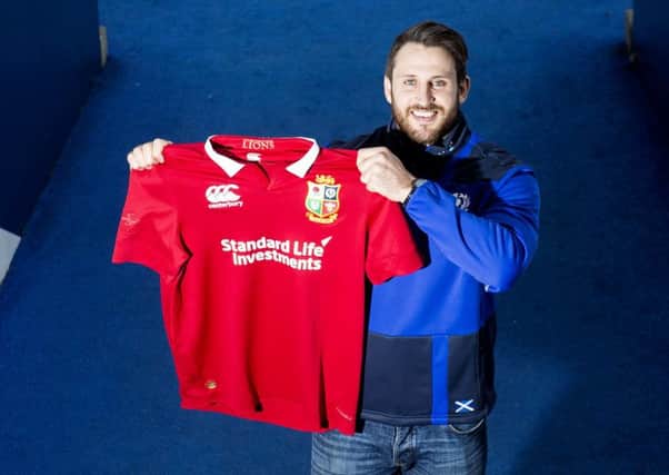 If the jersey fits: Tommy Seymour, is relishing the chance to wear the famous red stripe.
Main photograph: Gary Hutchison/SNS