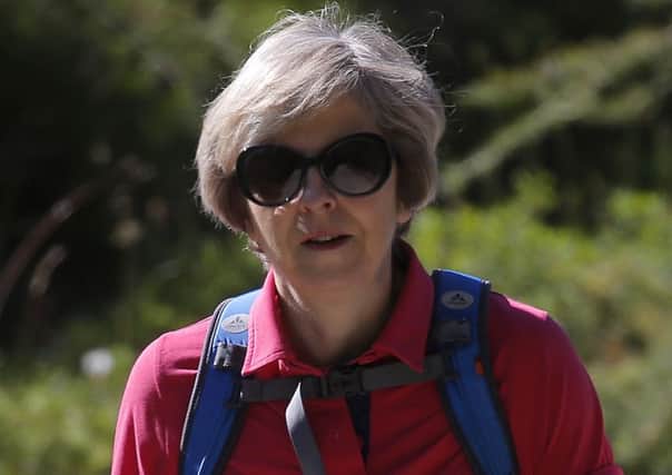Theresa Mays walk in Snowdonia might have changed the course of politics, with grim consequence for Labour. Picture: Getty Images