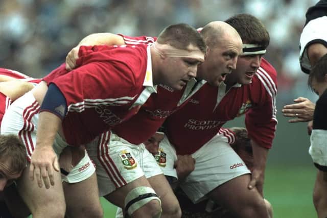 Scotlands Tom Smith, right, with Irelands Paul Wallace and Keith Wood in 1997. Photograph: Alex Livesey/Getty Images