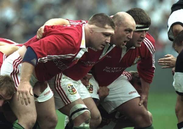 Scotlands Tom Smith, right, with Irelands Paul Wallace and Keith Wood in 1997. Photograph: Alex Livesey/Getty Images