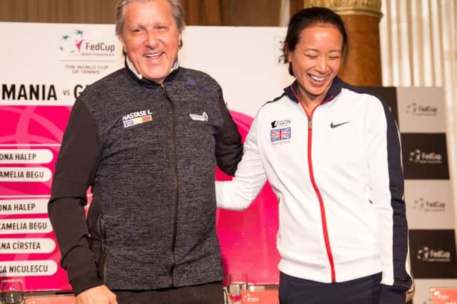 Ilie Nastase and Anne Keothavong pose for photos at the Fed Cup. Picture: Getty Images/Getty Images