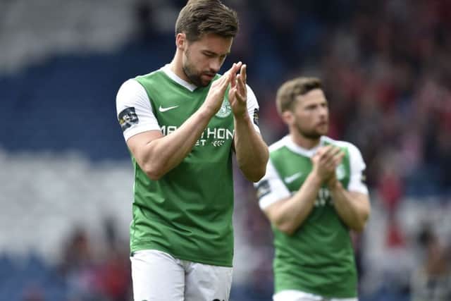 Darren McGregor applauds the fans at full time