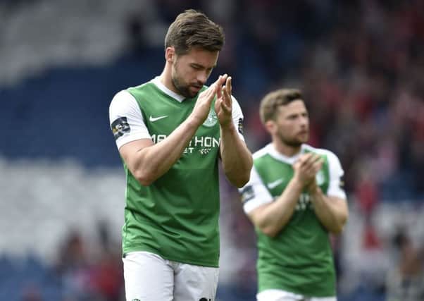 Darren McGregor applauds the fans at full time