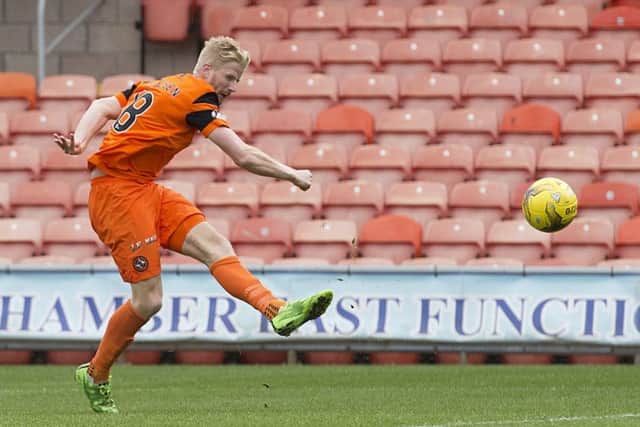 Thomas Mikkelsen scores the controversial opening goal. Picture: Alan Harvey/SNS