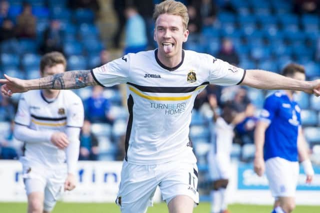 Dumbarton's Robert Thomson celebrates his goal. Picture: Sammy Turner/SNS