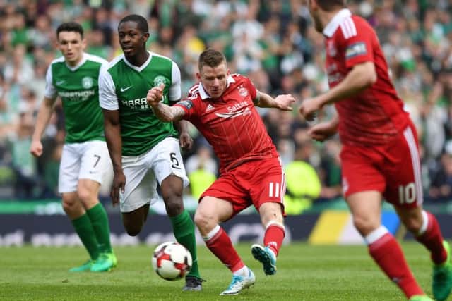 Aberdeen's Jonny Hayes fires home the late winner. Pic: SNS/Craig Williamson