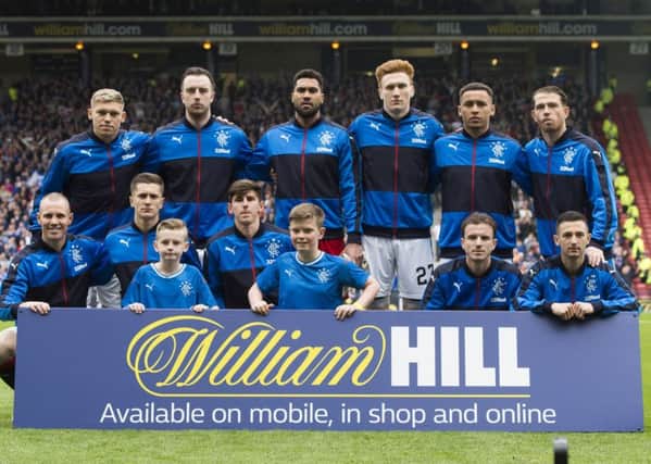 Rangers' starting XI line up prior to kick-off. Picture: SNS