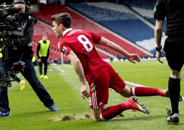 Ryan Christie celebrates having given Aberdeen a 2-0 lead over Hibs. Picture: SNS