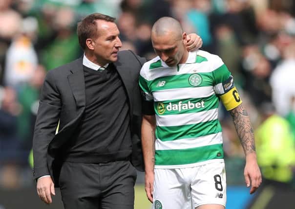 Scott Brown, right, and Celtic manager Brendan Rodgers during the Scottish Cup semi-final win over Rangers. Picture: Ian MacNicol/Getty Images