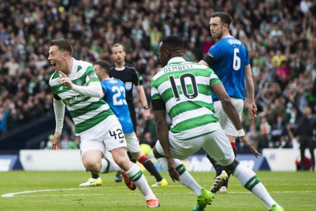 Callum McGregor wheels away in celebration after opening the scoring. Picture: SNS.