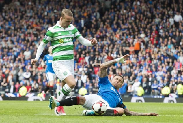 Rangers' James Tavernier gives away penalty for challenge on Celtic's Leigh Griffiths. Picture: SNS