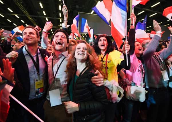 Supporters celebrate after the results of the first round of the presidential election. Picture: Getty