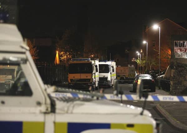 A view of the area where dissident republicans left a bomb which was discovered in an alleyway beside Holy Cross Boys' Primary School in Ardoyne. Picture: PA