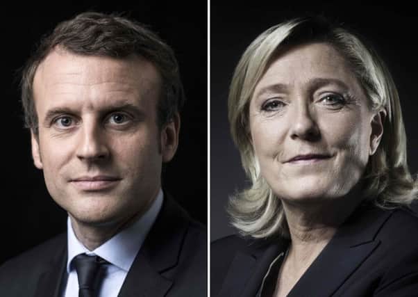 French presidential election candidate for the En Marche! movement Emmanuel Macron and French presidential election candidate for the far-right Front National party Marine Le Pen posing in Paris. Picture: AFP PHOTO / JoÃ«l SAGET AND Eric Feferberg.