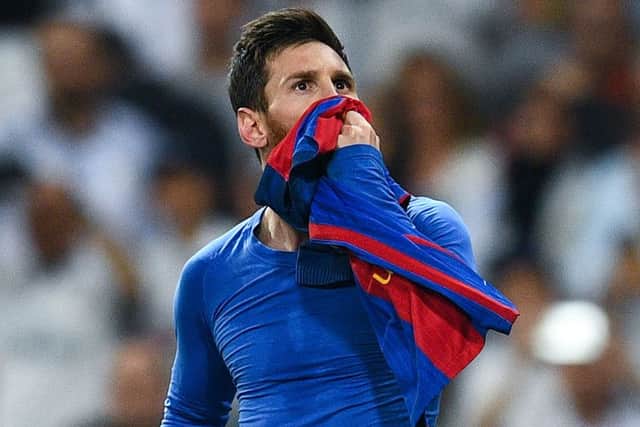 Lionel Messi celebrates his match-winning performance against Real Madrid on Sunday. Pictrure: Getty.