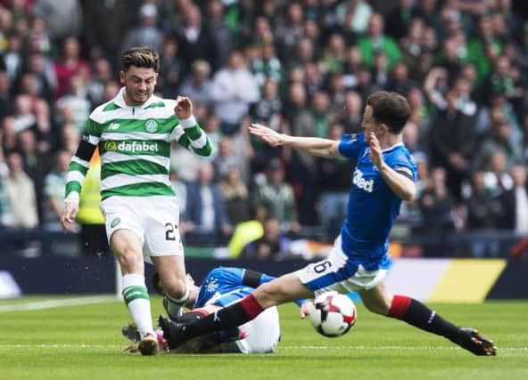 Andy Halliday, right, just before he takes out Celtic winger Patrick Roberts. Picture: SNS