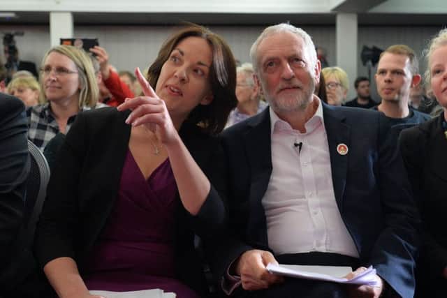 Jeremy Corbyn and Scottish Labour leader Kezia Dugdale talk together ahead of a General Election speech at the Carnegie Conference Centre in Dunfermline. Picture: Getty