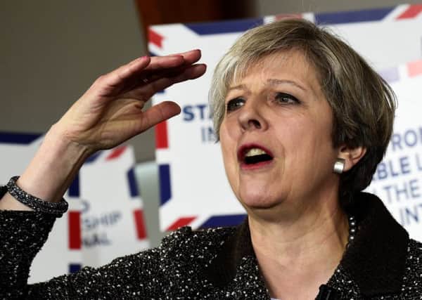 PM is answering her critics with this election, says John Maguire. Picture: Rebecca Naden/PA Wire