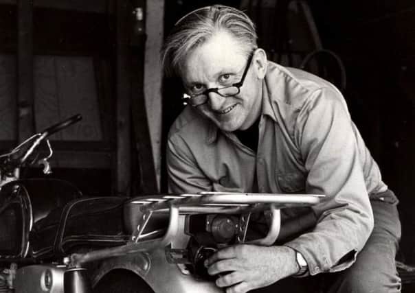 Robert M Pirsig working on a motorcycle in 1975 (William Morrow via AP)