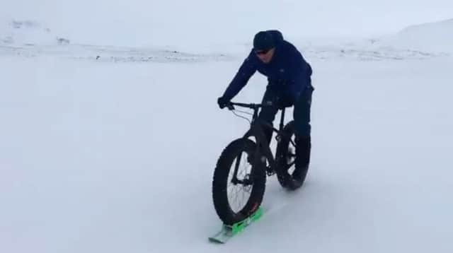 Sir Chris Hoy tries out the 'ski-bike'. Picture: Twitter/@chrishoy