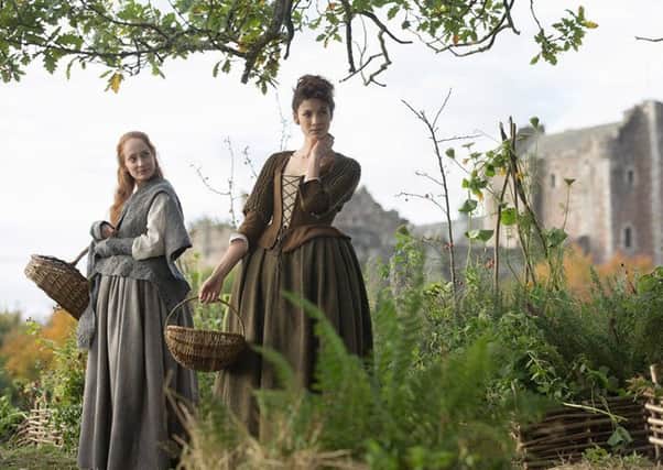 Geillis Duncan (Lotte Verbeek) and Claire Fraser (Caitriona Balfe) pictured in front of Castle Leoch (in reality, Doune Castle). Picture: Starz