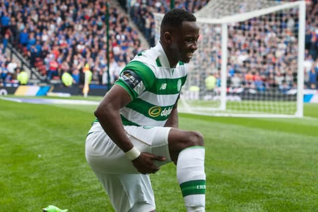 Moussa Dembele clutches his hamstring during the Scottish Cup semi-final against Rangers. Picture: John Devlin