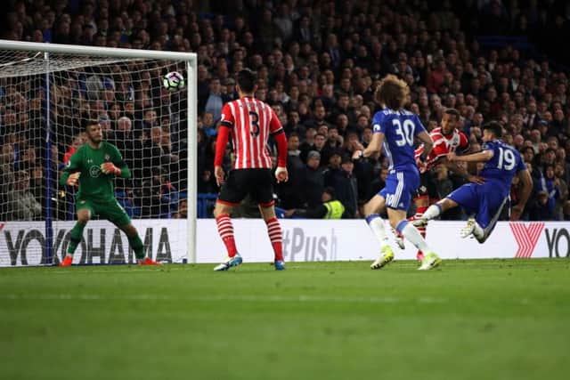 Diego Costa (No 19) scores his first and Chelseas third goal against Southampton with a diving header. Picture: Nick Potts/PA Wire